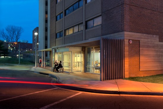 The modified entryway of Benson Hall includes contoured paving with minimal entry thresholds for ease of access.
