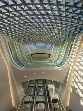 Open elevator shafts in the west atrium. 