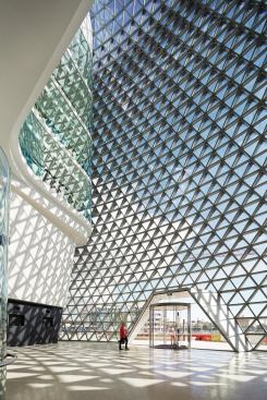 Aluminum shades of different depths regulate interior temperatures in the east and west atriums. (The west atrium is shown here.)