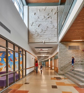 A bas relief panel designed by Barry Svigals decorates the lobby