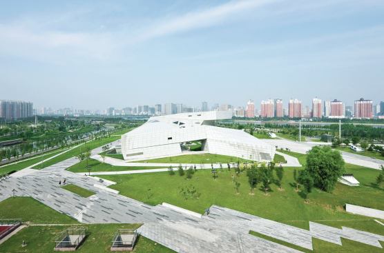 The building’s faceted form is sited in a larger complex of five cultural buildings in Taiyuan, a city of 4 million located 325 miles southwest of Beijing. 