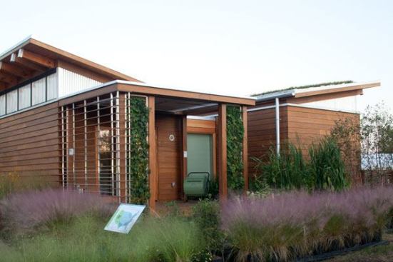 The home also features a green roof that slows rainwater runoff to the landscape and improves the house's energy efficiency.