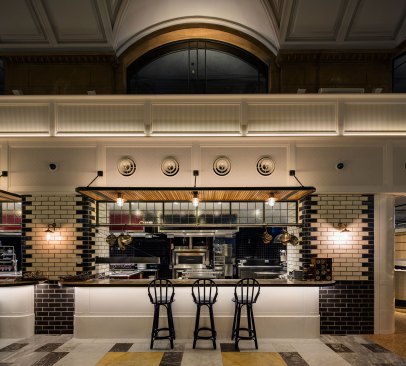 One of the seating areas overlooking the open kitchen.
