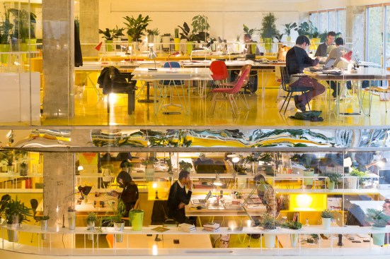 Second Home has a membership-based business model. The small companies that use the facility can occupy acrylic-lined pods seating anywhere between five and 20 people. The interior accommodates 400 in total.