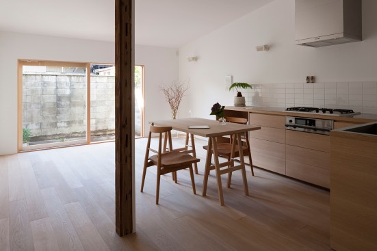Kitchen and dining area with sliding glass door