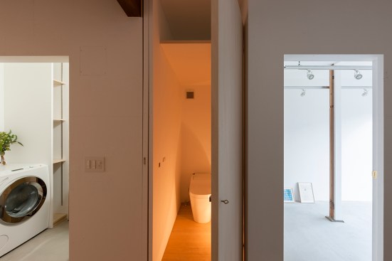 View of bathroom facilities and studio on first floor