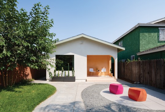 A gut-renovated 1923 bungalow, the Mouse House/Peach Pit ADU in LA sports a new, second-story addition that is hidden from the street.