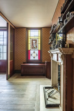 The bathroom features a covered bathtub and the original wood floors, stripped of Victorian-era varnish and rubbed with lime and sand to bring back the original patina. Soane’s bedroom is beyond, at left.