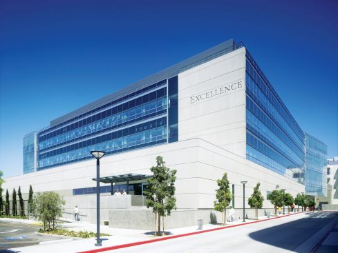 The building’s glazed façades feature custom ceramic frit panels with words describing the St. Joseph Health System’s core values—such as “with an orientation toward excellence”—and some of the handwritten text of hospital founder Mother  Bernard, one of the founding sisters of St. Joseph. Glazing: PPG Solarban; 80 insulated glass units in clear; ppg.com - Spandrel Glass: Northwest Industries; Sealed spandrel glass units in #453068 green; nwiglass.com - Light Poles: Bega; 9898MH pole top luminaire; bega-us.com