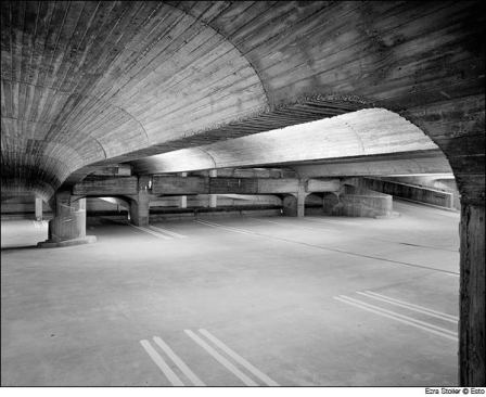Paul Rudolph  Photographer: Ezra Stoller © Esto  The 700-foot-long Brutalist structure holds 1,300 cars. From its top floor, under concrete cobra lights, you can see the steeples of the New Haven Green.