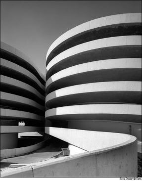 Skidmore, Owings & Merrill  Photographer: Ezra Stoller © Esto  Customers enter and exit the store via helical ramps in these twin cylindrical structures.
