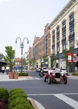 This 135-unit building is the crown jewel in a larger plan to bring urban living to a rapidly growing county outside Dayton, Ohio. The building blends residential and ground floor retail space in a design that incorporates a concrete podium topped with wood-frame construction. Ever mindful of the need for flexibility, the architects inserted internal mechanical shafts through the residential units to allow for future restaurant locations within the retail spaces. 
Project: Gilbert Court at The Greene, Beavercreek, Ohio 
Design Architect: Torti Gallas and Partners 
Architect of Record: Meacham and Apel Architects 
Builder: Messer Construction Co. 
Developer: Steiner and Associates