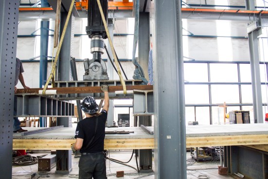 A hydraulic actuator applied the loads at two locations on the full-size specimen. The testing protocol was designed in conjunction with Oregon State University's civil engineering department.