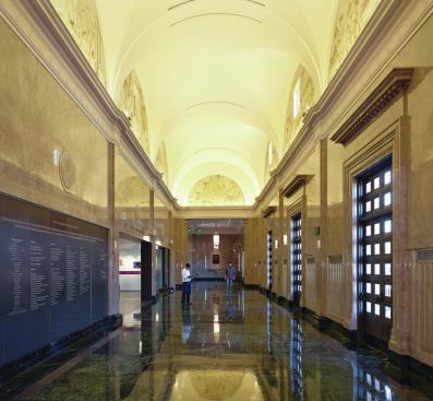 The vaulted post office lobby boasts restored frescoes by WPA artist Charles Kassler.