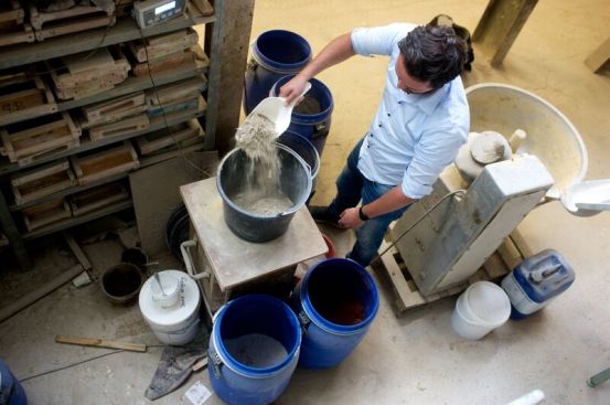 Mixing raw materials for the WaterBasedBrick module.