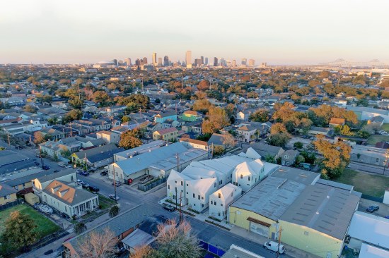 An idea derived from the Starter Home research, the speculative 9th Street development project replaces an existing warehouse and vacant parcel with 10 single-family residences and one two-family structure.