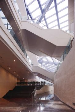 The circulation sequence, which involves a series of ramps and promenades, becomes evident in the Piranesian criss-crossing of staircases, seen here at the eastern edge of the atrium.