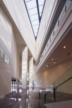 The atrium’s appearance changes with each sight line (here, looking south toward the main entry) as the parametric form of the building reveals itself.