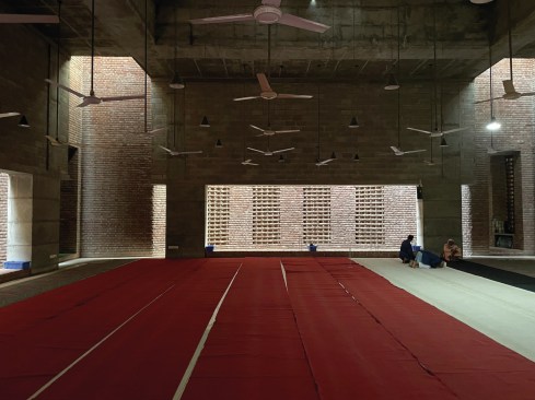 The mosque, built with terracotta bricks, was designed with open brickwork allowing light and air to filter into the interior.