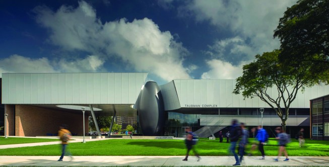 The Taubman Complex’s main façade, viewed here from the southwest, features an ETFE scrim that wraps the third floor, and a carbon-fiber-clad black “lozenge” element that marks the entry.