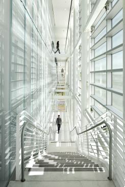 The perimeter stair located on the eastern, glazed side of the building.