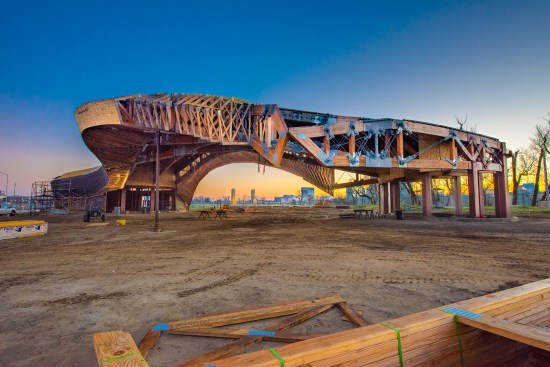 The Barn comprises a series of angled glulam trusses with a glulam and steel web