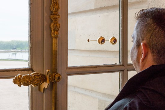 The fish-eye lenses within "The Gaze of Versailles" produce a wide panoramic view of the French estate's grounds.