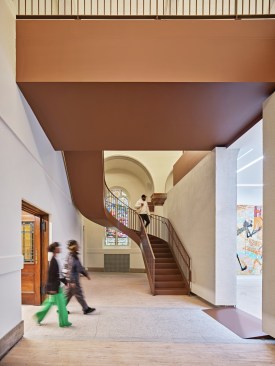 View of the entry to the main gallery and stairway to mezzanine level.