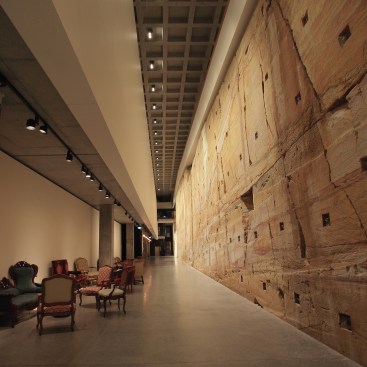 The Void is the lowest level of the Museum of Old and New Art. It includes a 240-million-year-old, almost 40 foot high, sandstone wall.