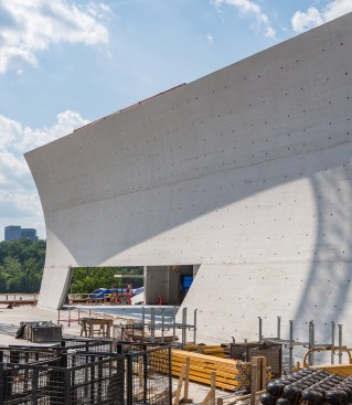 Construction photo showing curved exterior wall