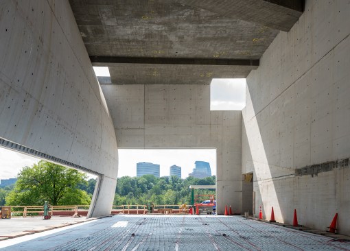Construction photo of interior of central pavilion, looking west