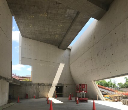Construction photo of interior of central pavilion, looking east