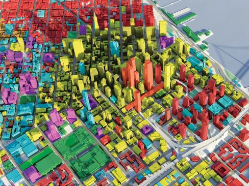 The embedded metadata includes zoning and building typology information, which can be used by the firm or the planning department to generate models such as this one, which shades buildings according to their recorded land use.