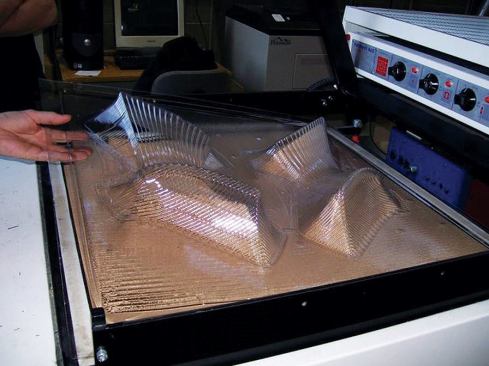 The wall is currently undergoing a rigorous testing process. Test pods are vacuum-formed and assembled, as are pieces of the modular duct framework which manage airflow through the system.