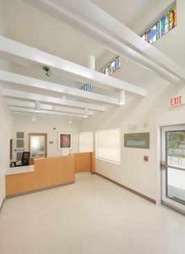 The lobby includes stained glass by Kim Clark Renteria.