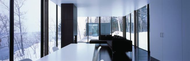 Living and dining area with view to studio beyond