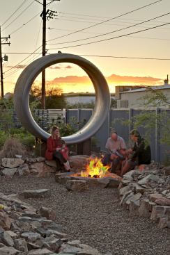 A repurposed jet cowling is a sculptural feature in the courtyard. 