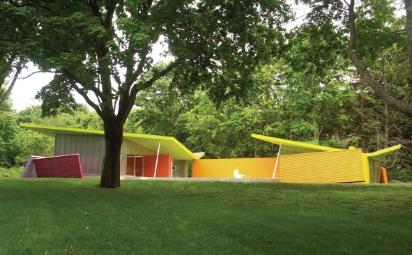 South and west walls are virtually solid, while east and north walls are highly glazed with overhangs to protect against summer sun, while also allowing in winter light.