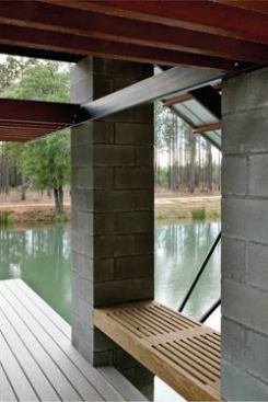 CHDA 2008 – Accessory Building / Grand Award  Architect: Robert M. Cain, Architect, Atlanta; Builder: Brunson Construction Co., Hampton, S.C.   The project consists mostly of the same materials used on the main house—salvaged wood, steel beams, and a standing seam metal roof. From a distance, the overall effect is that of a little house with transparent walls. The owners use the dock for activities such as fishing, boating, and swimming. But its most important function is providing a spot to just sit and enjoy the beauty of the site.