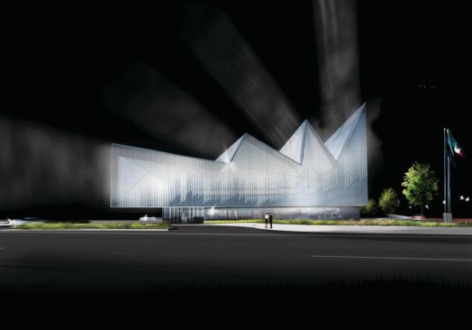 West façade at night.