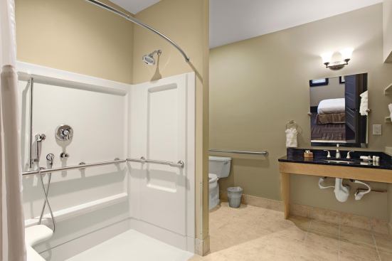 Bathroom

Kohler WaterSense-certified faucets, showerheads, and Cimarron Class 6 1.28-gpf toilets keep water use low in each bathroom. Energy Star humidity-sensing ventilation fans from NuTone automatically turn on and off as needed to clear the air. Kohler: 800.456.4537. www.kohler.com. NuTone: 888.336.3948. www.nutone.com.