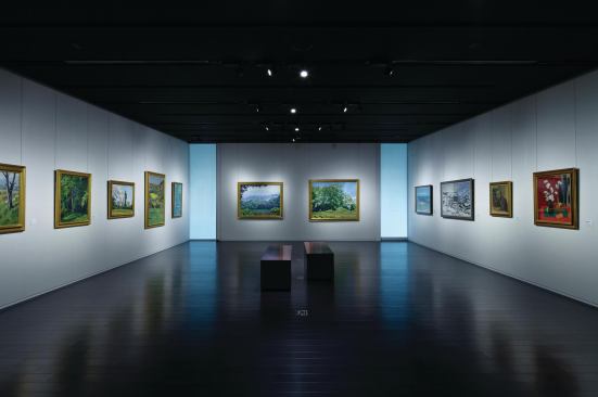 One of two galleries on the upper level is used for the display of paintings and other works that can withstand exposure to more standard light levels.