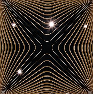 The plywood continues to the ceiling, where it conceals mechanical systems, and even to the pedestals that support the tables. 