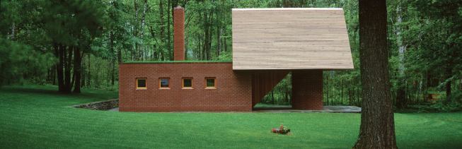 The architect returned nearly a decade later to design a sauna, located just yards away from the house.