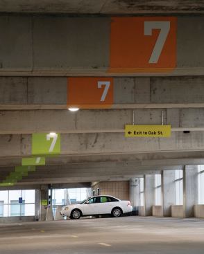 Signage over parking spaces