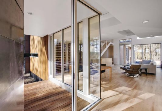 Narrow wings provide the home with natural light, views, and ventilation.