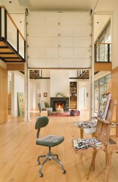 When the studio door is open, it highlights the home's double-height ceilings and loft-like feeling.