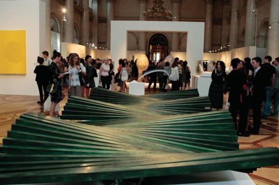 A view of the Calatrava exhibit in the Winter Palace’s Nicholas Hall, with the model of the World Trade Center Path Terminal, currently under construction, in the foreground. Visible in the background, within the arch, are two egg sculptures: “Almost Spring” (left) and “In Paradise” (right).