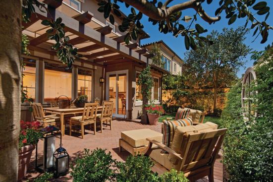 A lanai offers enough space for a family dinner al fresco; a useful feature in a California home.