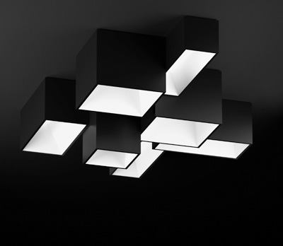 Link, Vibia

The Link lighting system, designed by Ramon Esteve, is a series of four different-sized square and rectangular modules with a matte white or charcoal-gray finish that can be joined in any configuration for a wide variety of ceiling silhouettes. The modules range in length from 45 inches long to 15 3/4 inches wide. The modules can connect on any of their four sides and simply require that there be a 5 1/2-inch overlap of surface area. A single electrical connection can support up to eight modules. Link is fully dimmable using a zero-to-10V electronic dimming ballast, has a polycarbonate diffuser, and uses two, 2G11 lamps from 18W to 40W, depending on the size of the module selected.

vibialight.com